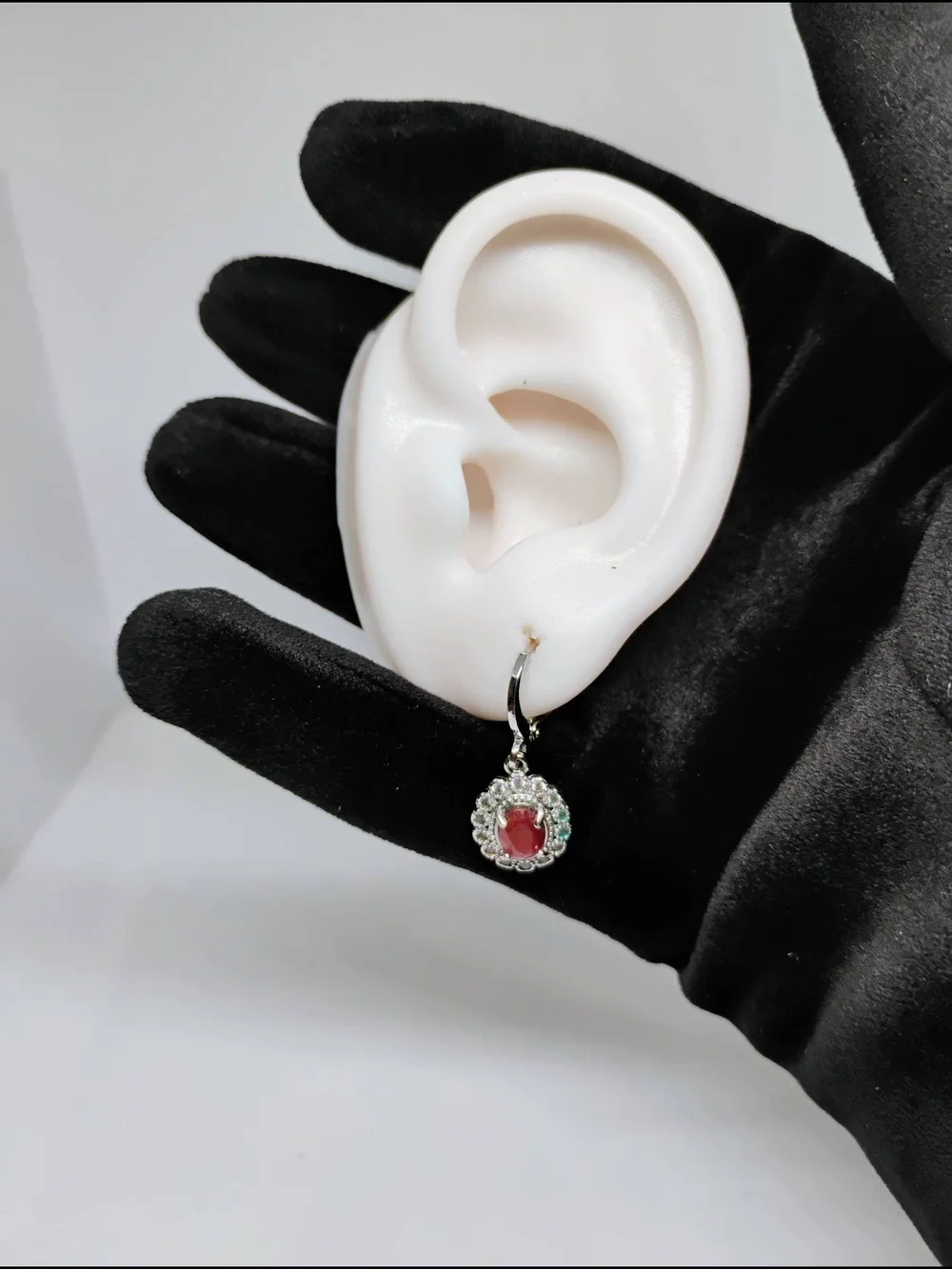 Ruby and Cuban Zirconia earrings oval gemstone surrounded by smaller clear stone